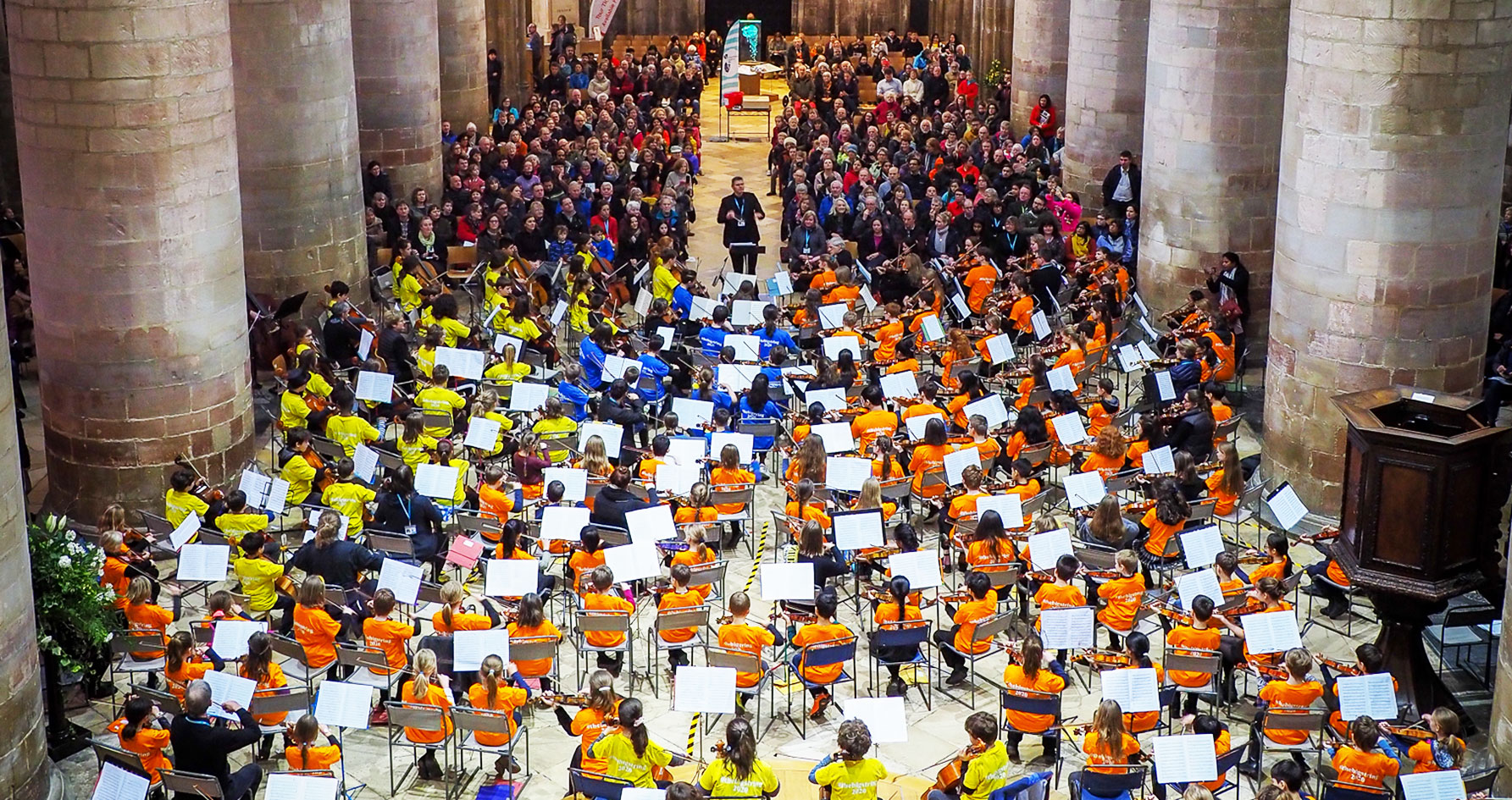 A wide shot photo of a concert