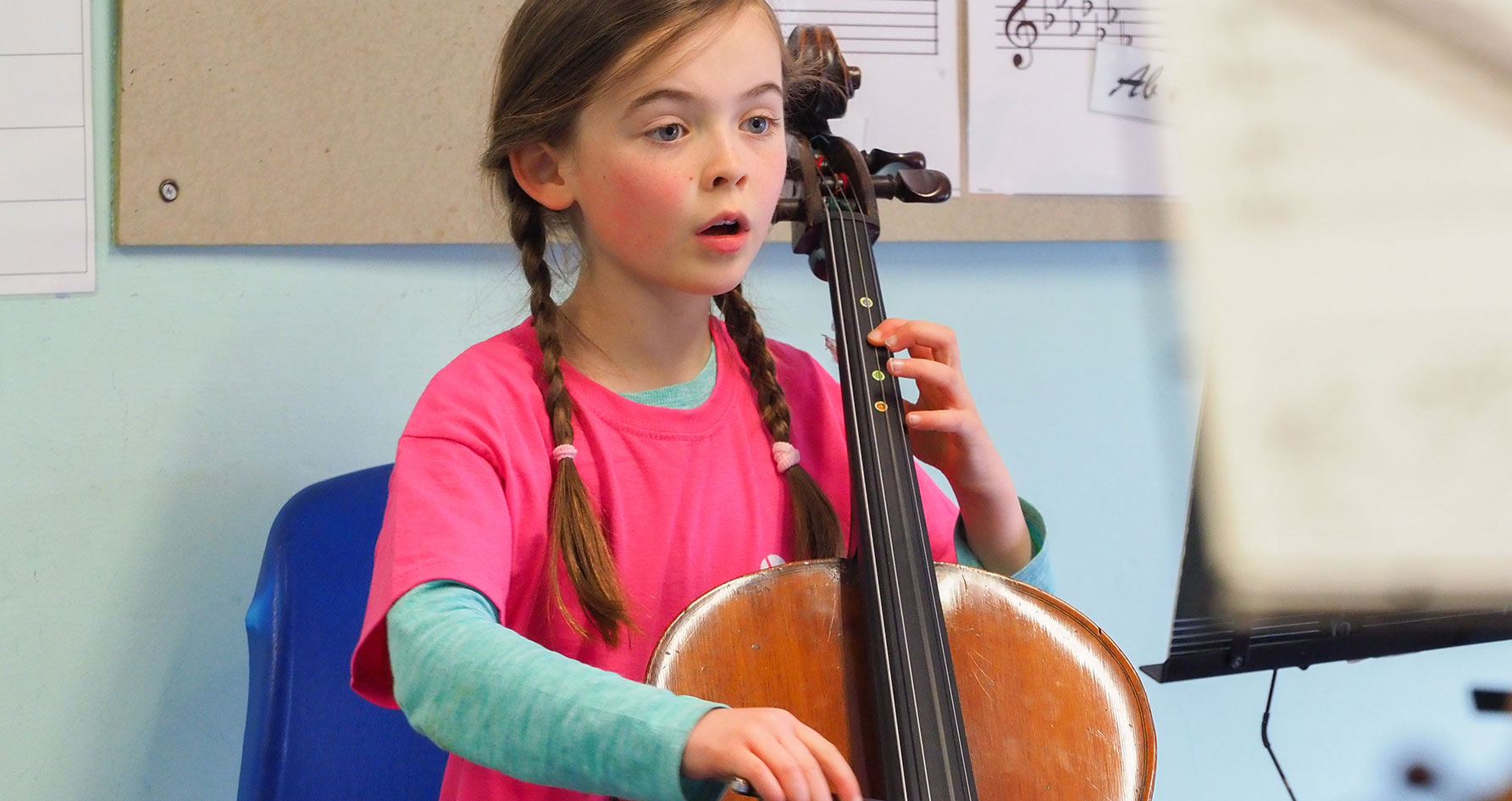 A girl playing an instrument