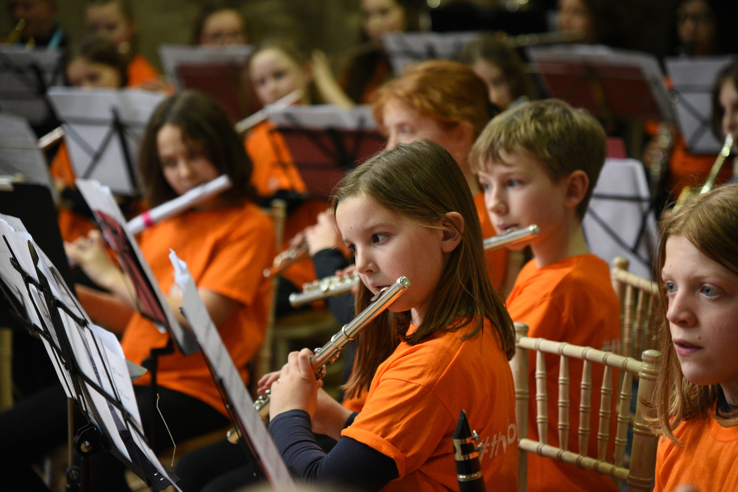 Adults practicing with instruments