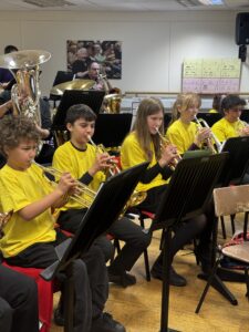 Group of students playing brass instruments