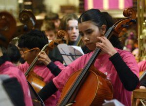 Close up shot of cello player