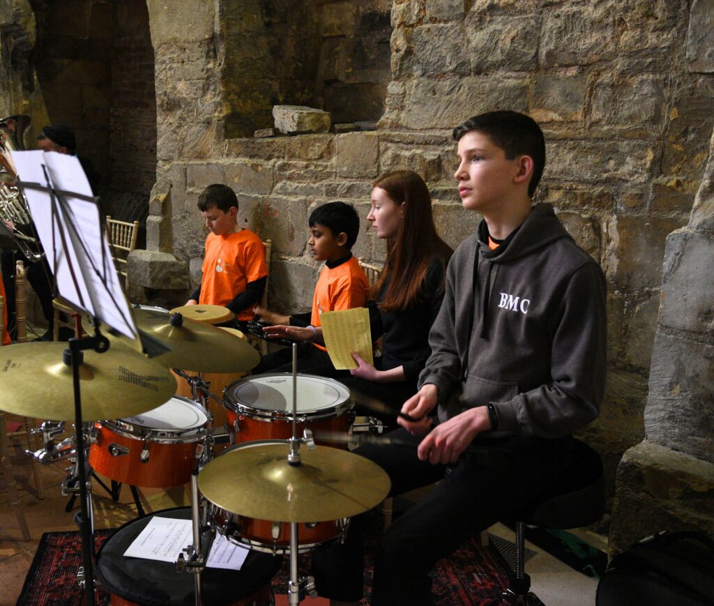 Four young percussionists